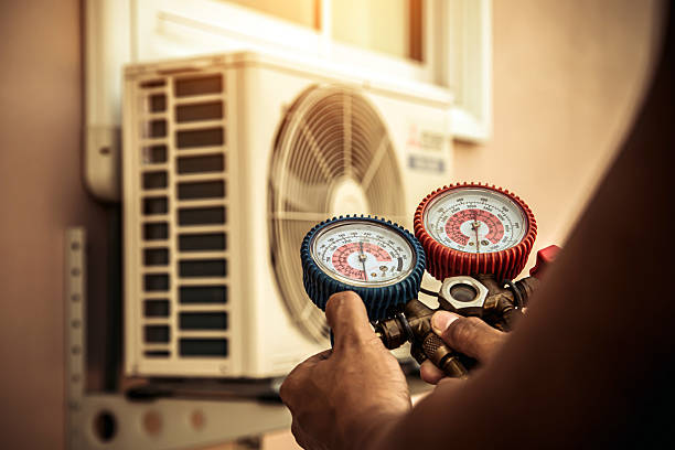 Professional Air Conditioning Service technician working in Summerdale, AL
